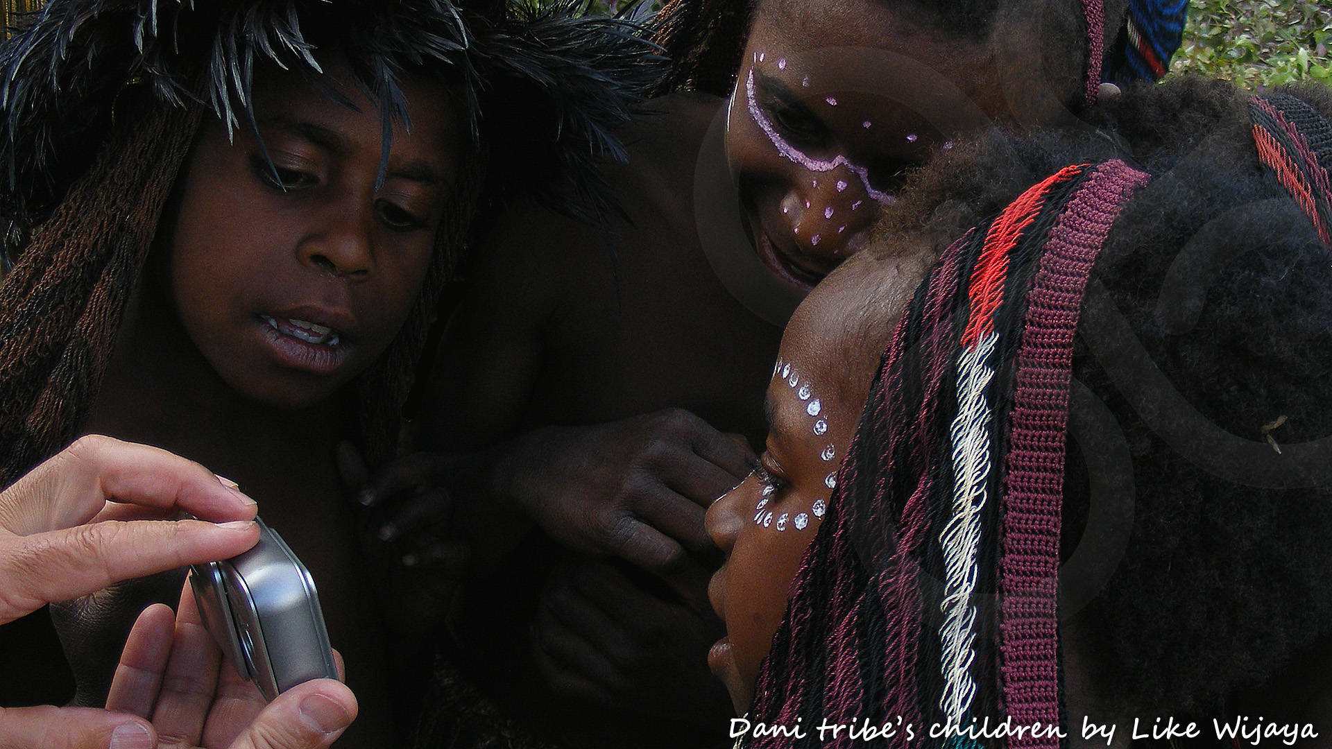 Indigenous peoples of West Papua are rapidly being overtaken by the 21st century. Copyright © Like Wijaya